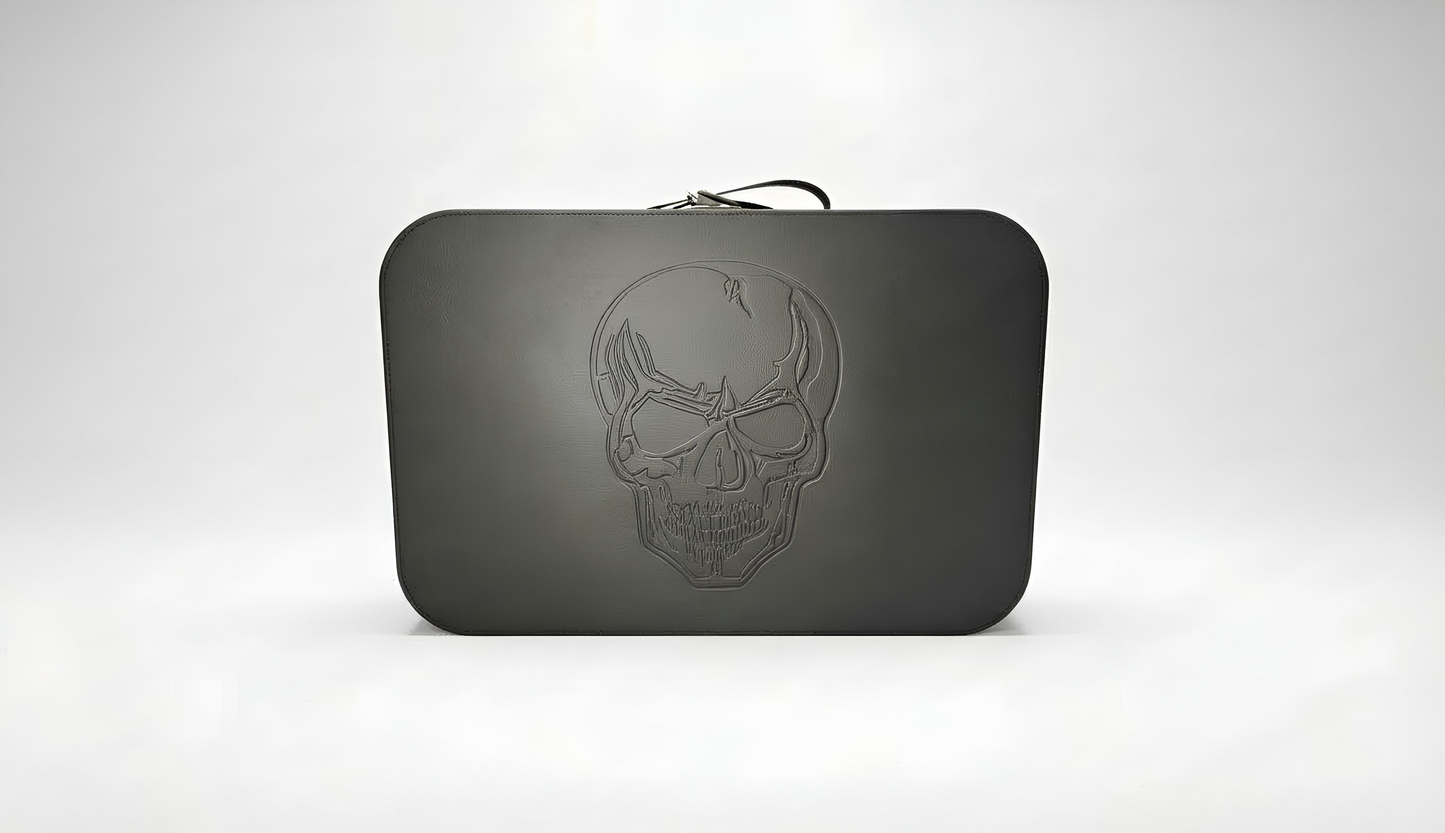 train case with skull embossed in faux black leather for travel or storage