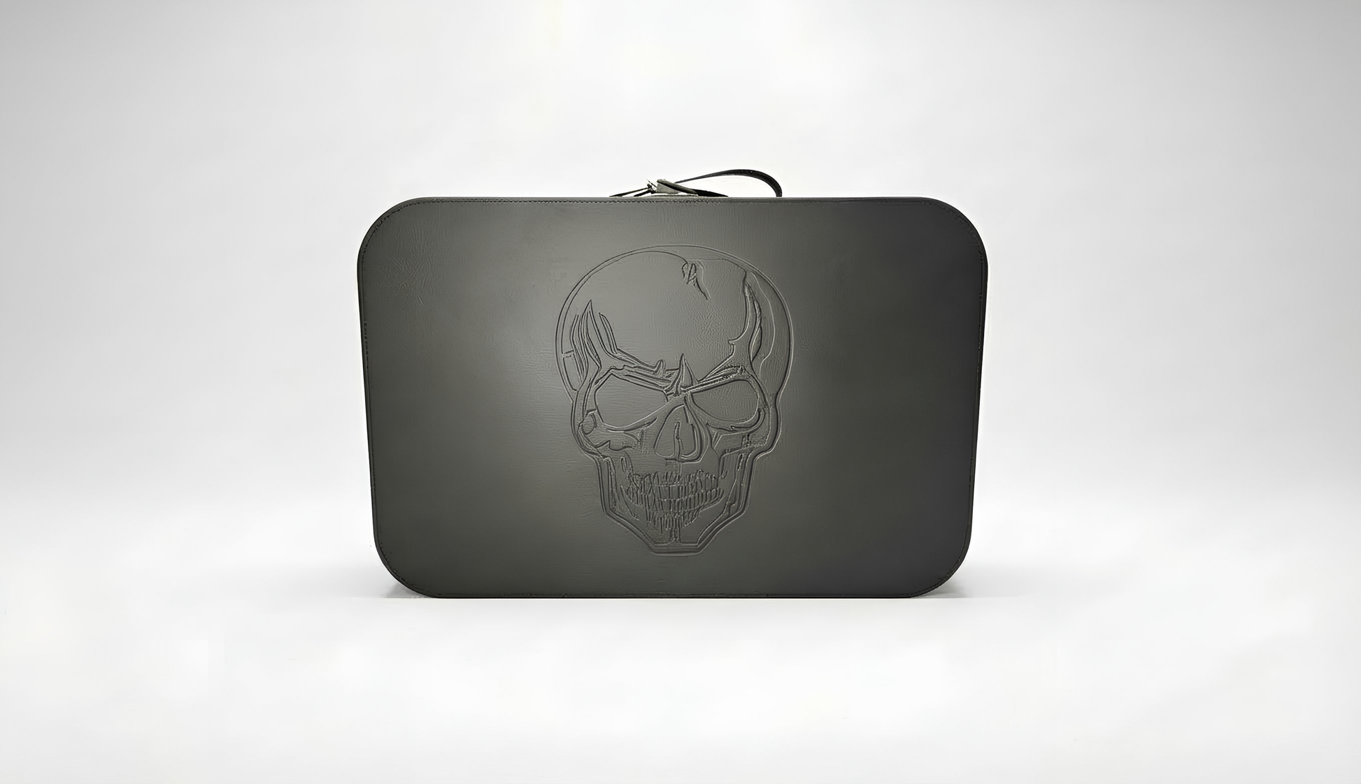 train case with skull embossed in faux black leather for travel or storage